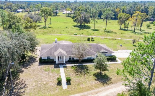 Home with a backyard golf course view
