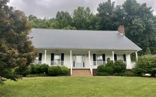 Beautiful country home featuring an attached garage,