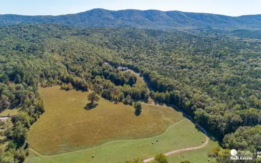 Country home & 64 acres, shop, barn, custom home & guest house