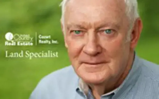 agent profile picture for Norman Cozort on horse properties website