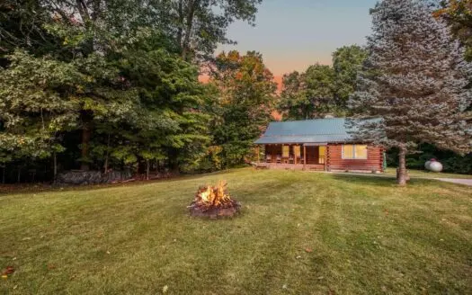 Lakefront Log Cabin on 10-acres Of Rolling Woodlands