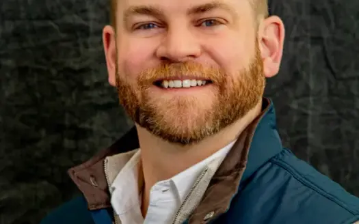 agent profile picture for Dan O'Connor on log homes website