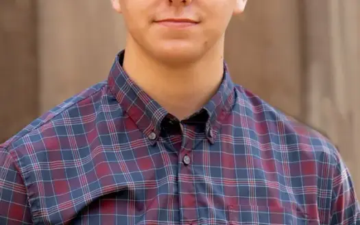 agent profile picture for Russell Richardson on log homes website