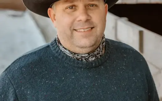 agent profile picture for Shane Anderson on log homes website