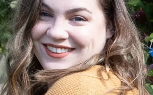 agent profile picture for Morgan Espling on log homes website