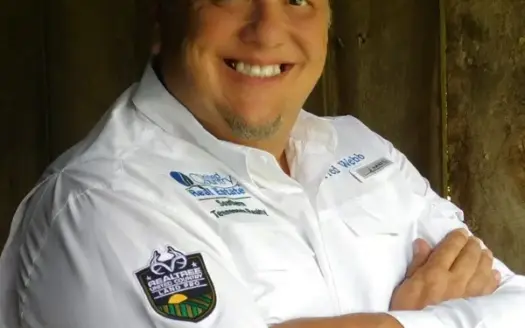 agent profile picture for Fred Webb on log homes website