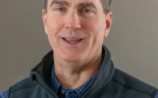 agent profile picture for Phil McPhail on log homes website