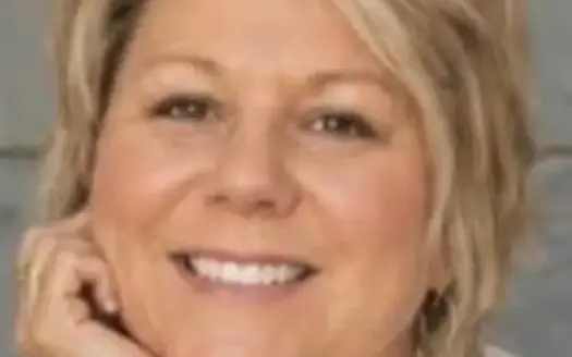 agent profile picture for Melissa Smithberger on log homes website