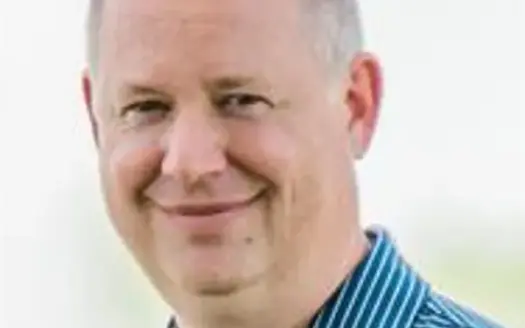 agent profile picture for Christopher Palmer on log homes website