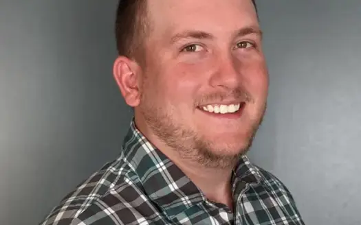 agent profile picture for Shane Vernon on log homes website