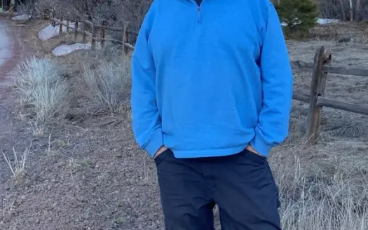 agent profile picture for Chris Dennison on log homes website