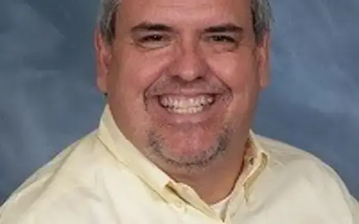 agent profile picture for William Hallcomb on log homes website