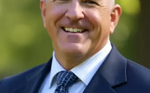 agent profile picture for John Payne on log homes website