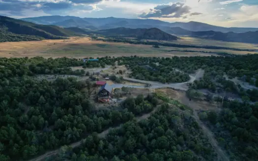 Western Colorado Log Home on 37 Acres with Mountain Views