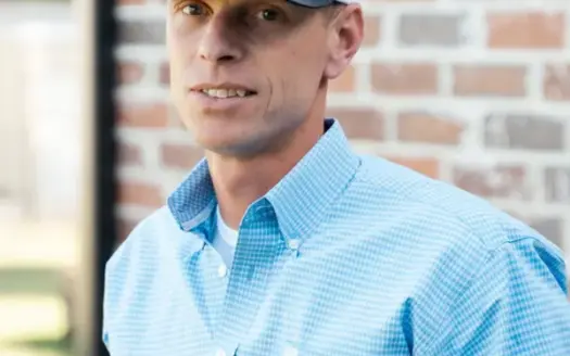 agent profile picture for Dru Horner on log homes website