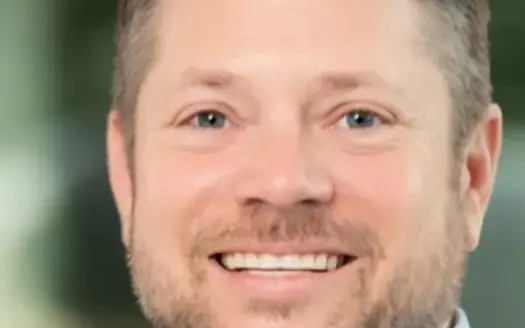 agent profile picture for Neal White on log homes website