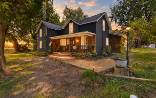 4-bedroom, 2-bath home is situated on 8.61+/- acres in Arkdale