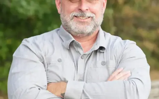 agent profile picture for Ryan Schuler on log homes website