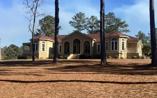 Luxury and charm all in one with acreage in Andalusia Alabama