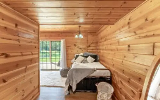 Custom Built Log Cabin and 57 Wooded Acres in Thayer MO