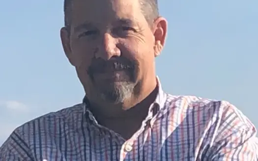 agent profile picture for Chris Respess on luxury homes website