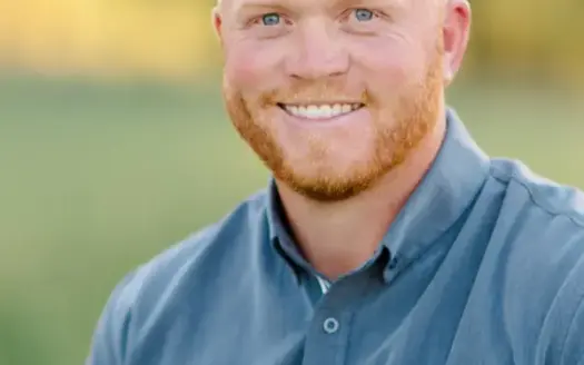 agent profile picture for Evan Ball on luxury homes website