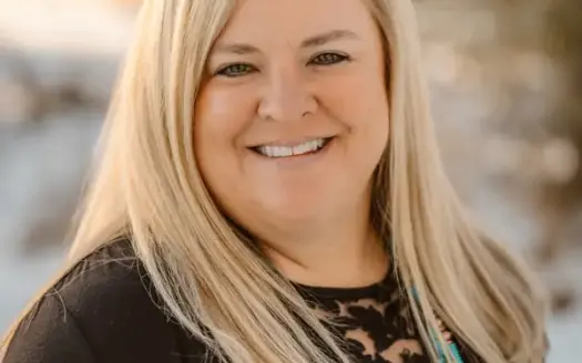 agent profile picture for Judi Martin on luxury homes website