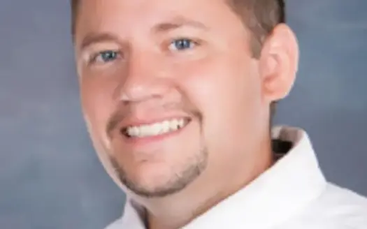 agent profile picture for Eric Neilson on luxury homes website