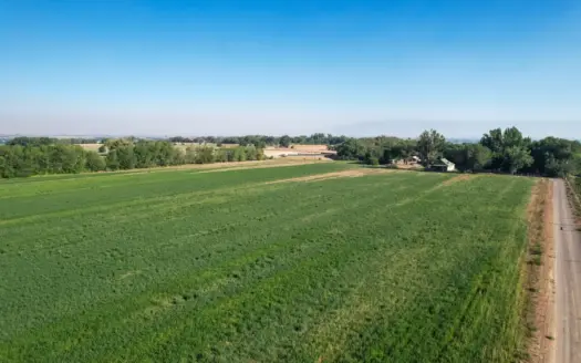 79+/- Acre Colorado Horse Property with 56 Shares, Pond & Pasture