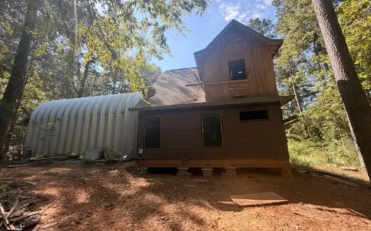 Quonset Hut Home & Off-Grid Acreage in Atlanta, TX for Sale