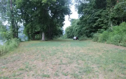 Unrestricted Acreage with White River Frontage