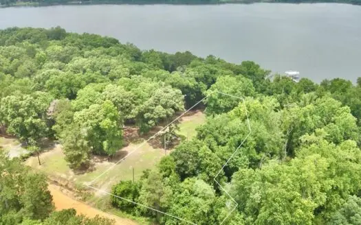 This waterfront property offers a rare combination of privacy!